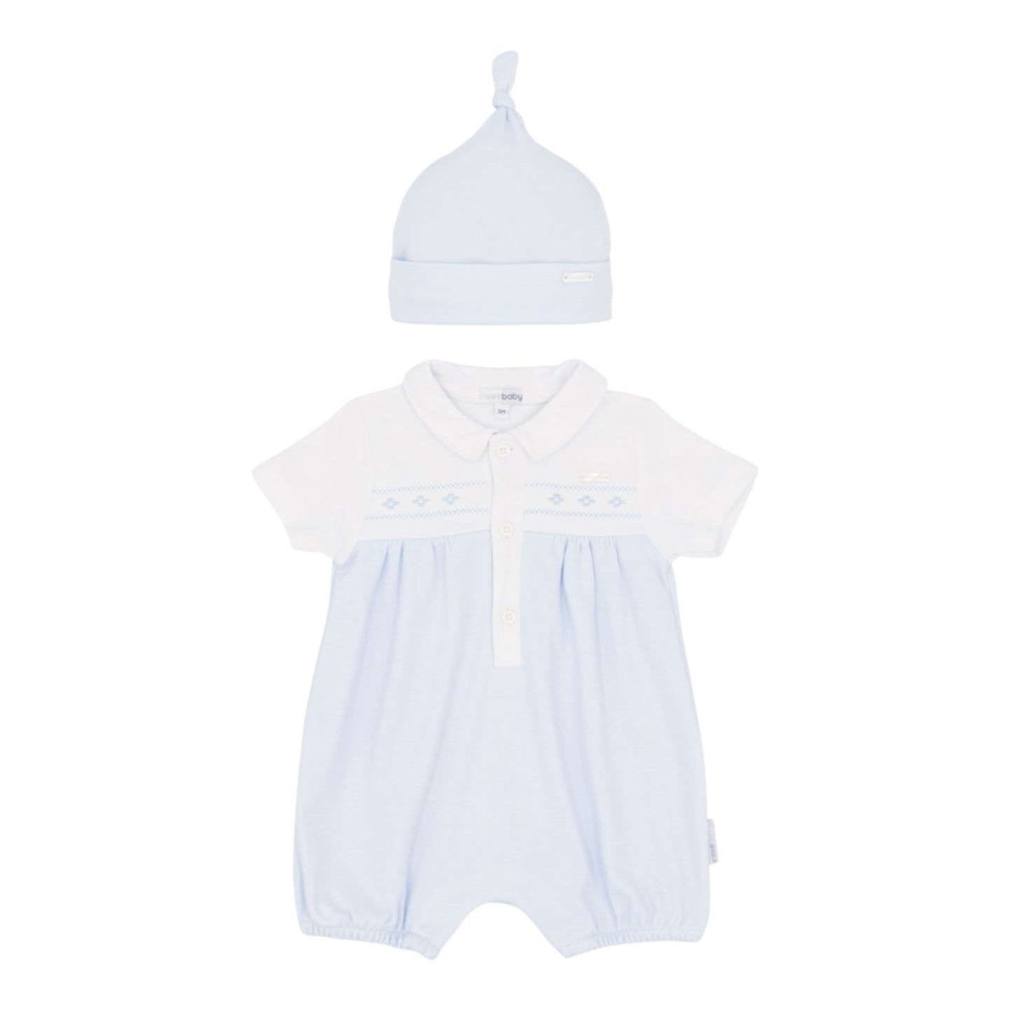 Ref; BB2274

Dress your little one in timeless style with this charming two-piece set from blues baby. The soft blue romper features a crisp white bodice and delicate collar, adorned with delicate blue embroidery for added elegance. Practical elastic cuffs and popper fastenings ensure a secure fit, while the matching light blue hat with a playful top knot completes the look. Crafted from 100% cotton for comfort and breathability, this outfit is machine washable for easy care.