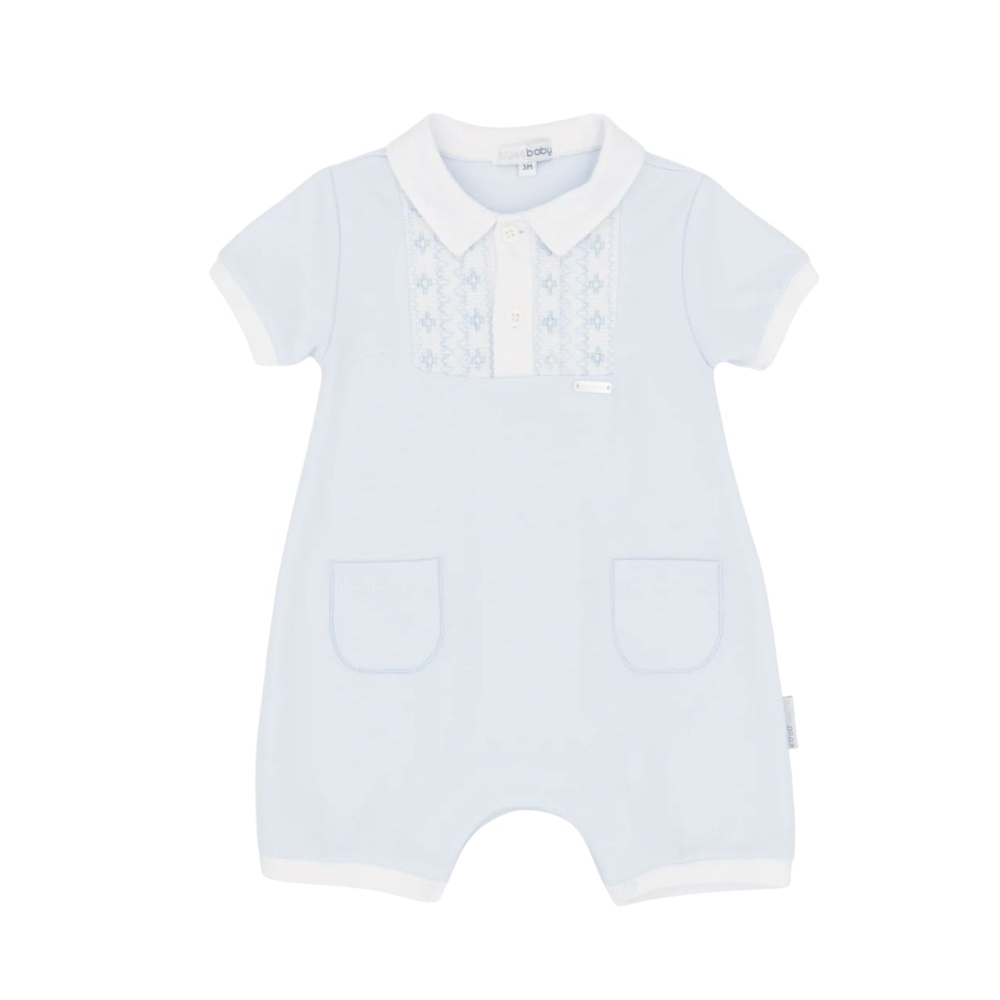 Ref; BB2273

Designed for effortless dressing, this soft blue romper keeps your little one comfortable all day long. Featuring a charming white collar and delicate chest embroidery, it combines practicality with understated style. The 100% cotton fabric is gentle on delicate skin, while convenient front pockets and leg poppers make nappy changes quick and easy. Machine washable for busy parents.
