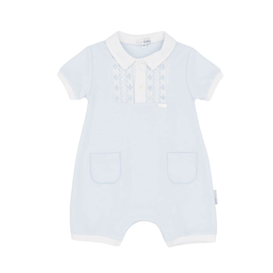 Ref; BB2273

Designed for effortless dressing, this soft blue romper keeps your little one comfortable all day long. Featuring a charming white collar and delicate chest embroidery, it combines practicality with understated style. The 100% cotton fabric is gentle on delicate skin, while convenient front pockets and leg poppers make nappy changes quick and easy. Machine washable for busy parents.