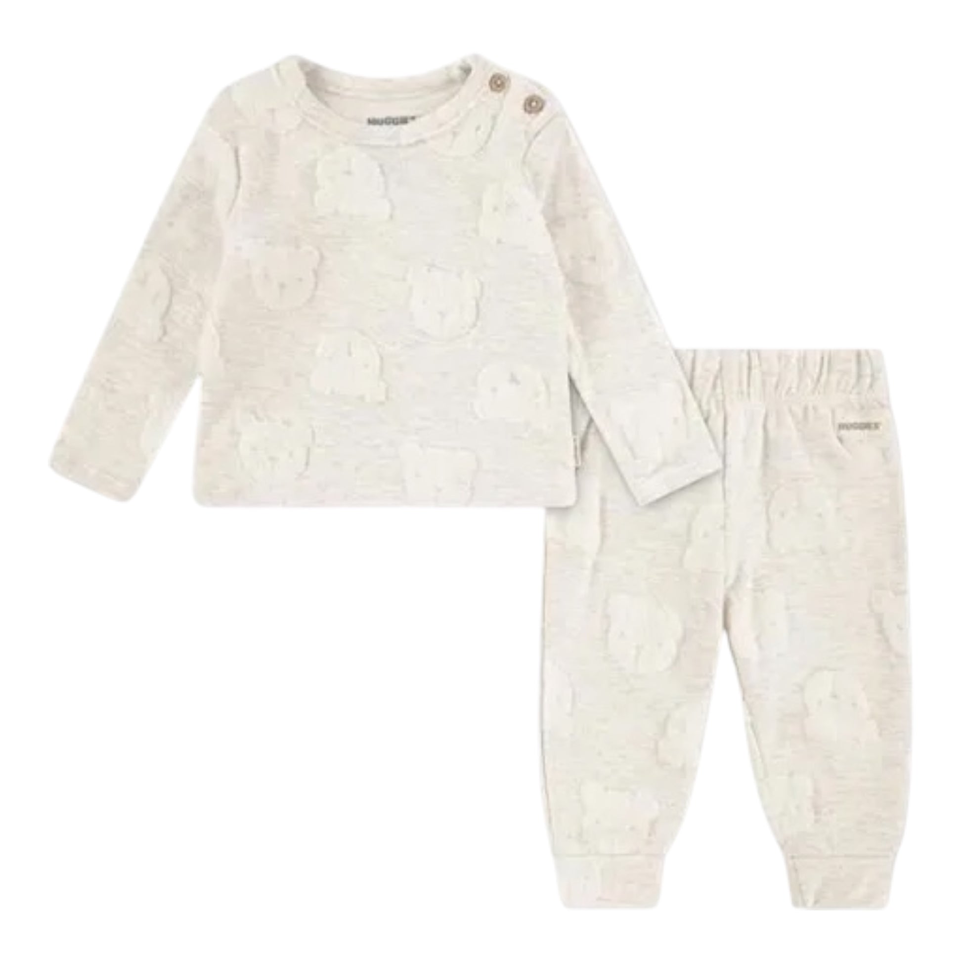 Baby outfit with long-sleeve top and pants on a cream background
