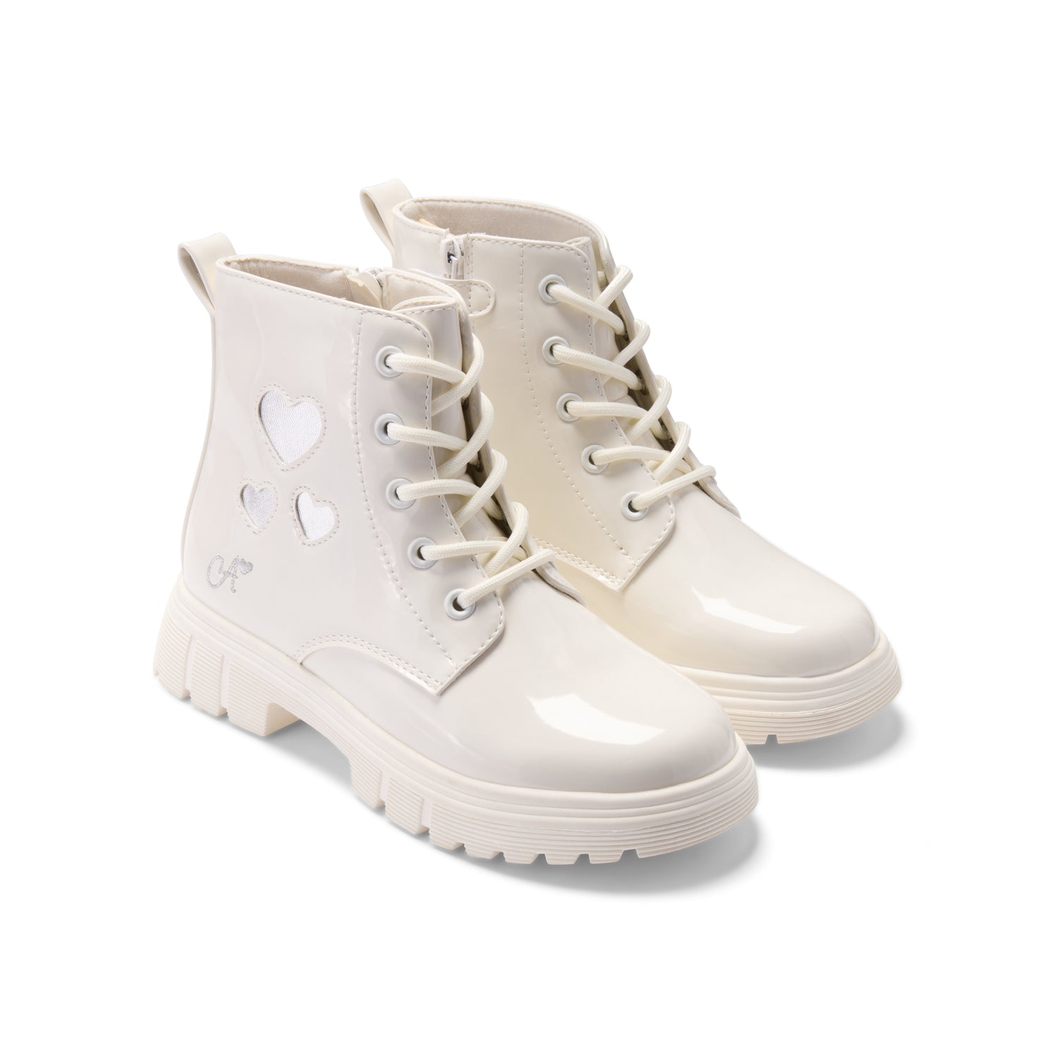 White boots with heart designs on a white background