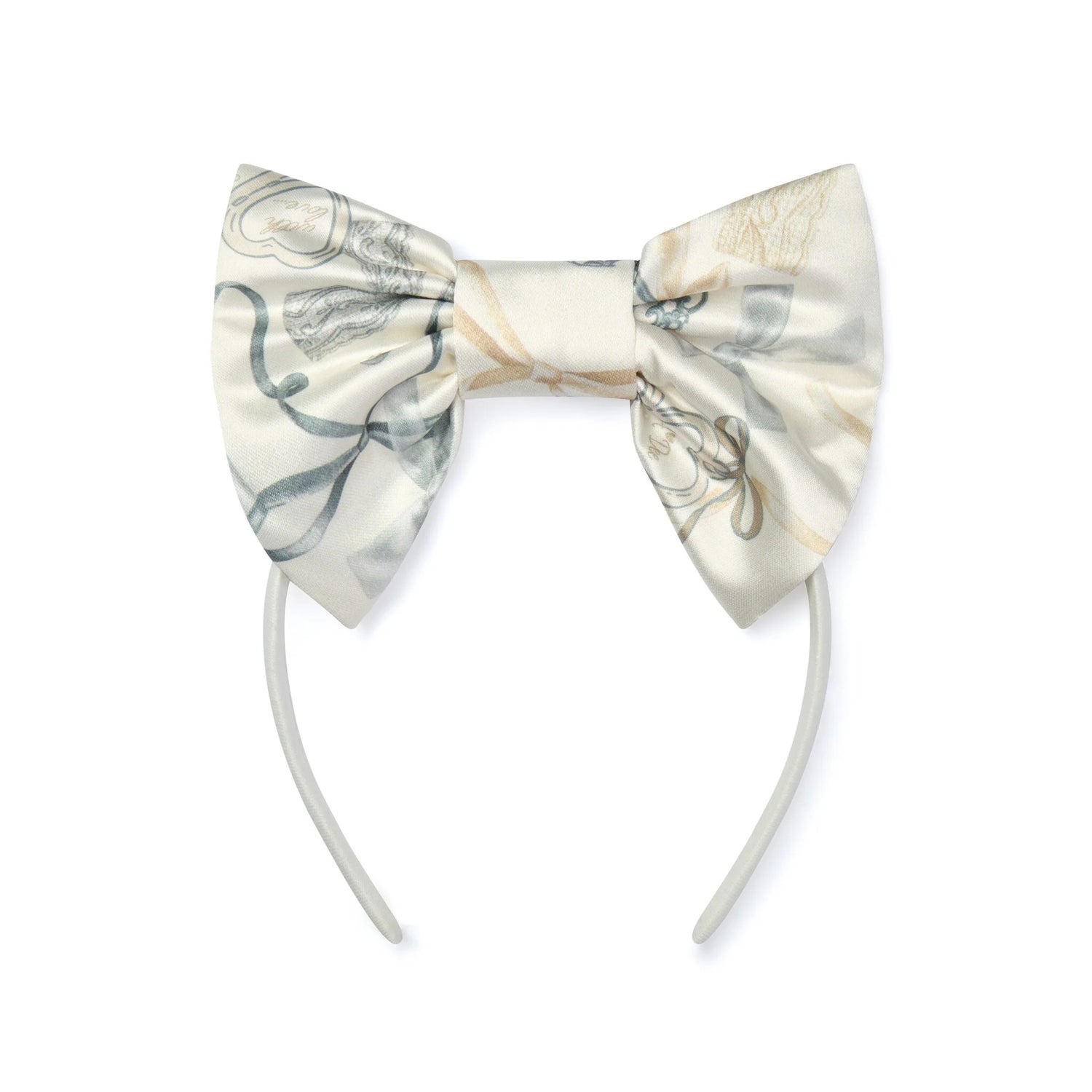 A bow headband featuring a large satin bow with a cream and beige baroque pattern, attached to a light gray elastic band, shown on a plain white background.