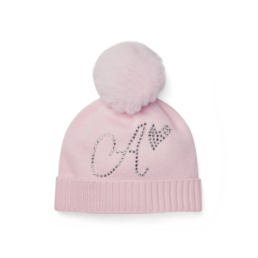 Pink beanie with pom-pom and decorative lettering on a white background