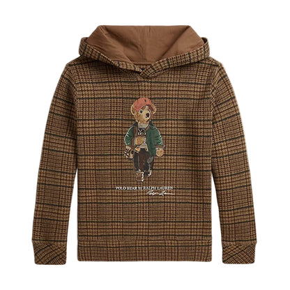 A brown and tan plaid pullover hoodie with a solid brown hood lining and a central graphic of the classic Polo Bear wearing a red hat and green jacket.